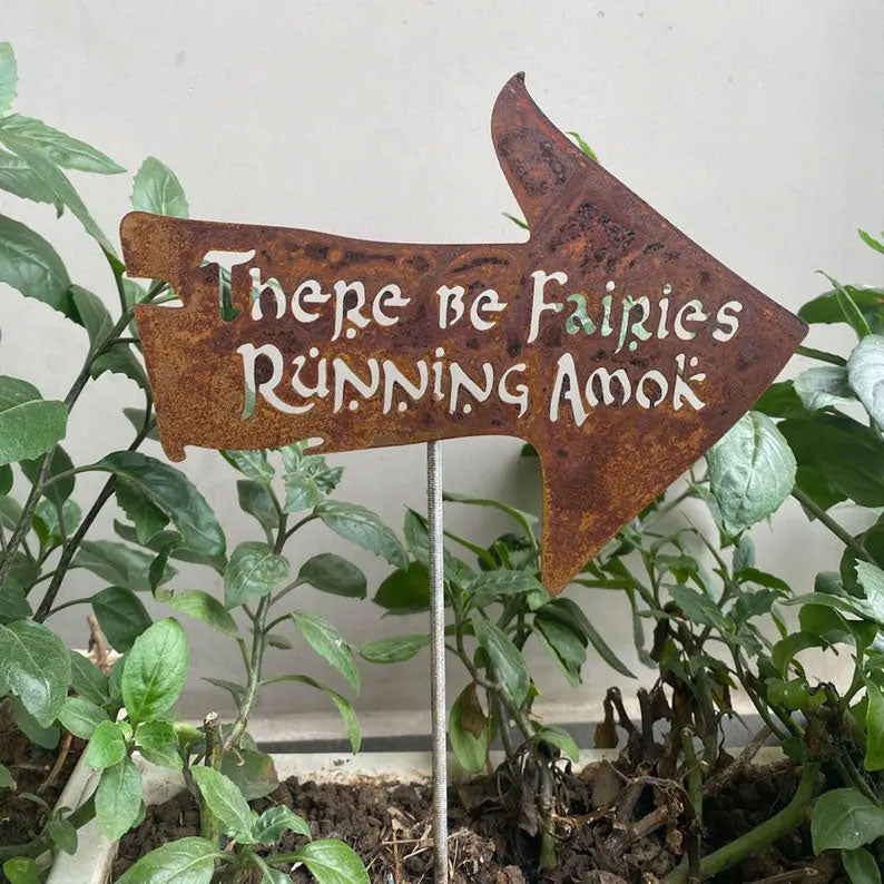 There Be Fairies Running Amok Sign