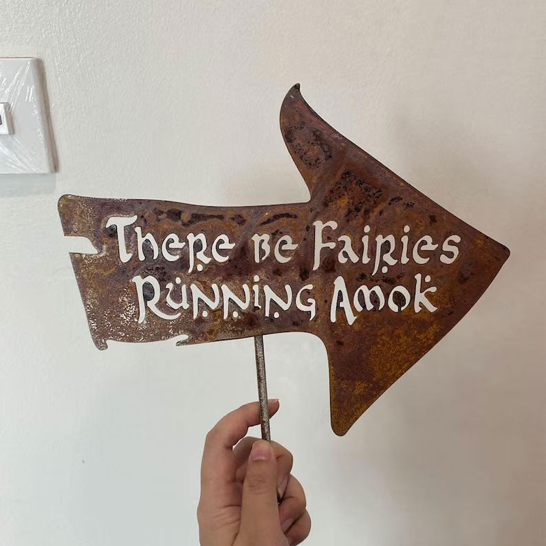 There Be Fairies Running Amok Sign