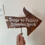 There Be Fairies Running Amok Sign