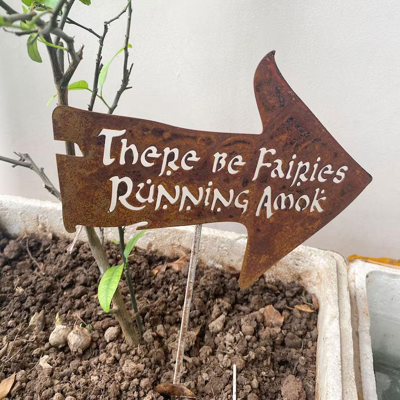 There Be Fairies Running Amok Sign